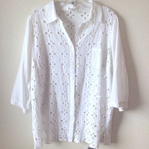 August Silk 100% cotton eyelet w/roll sleeves.